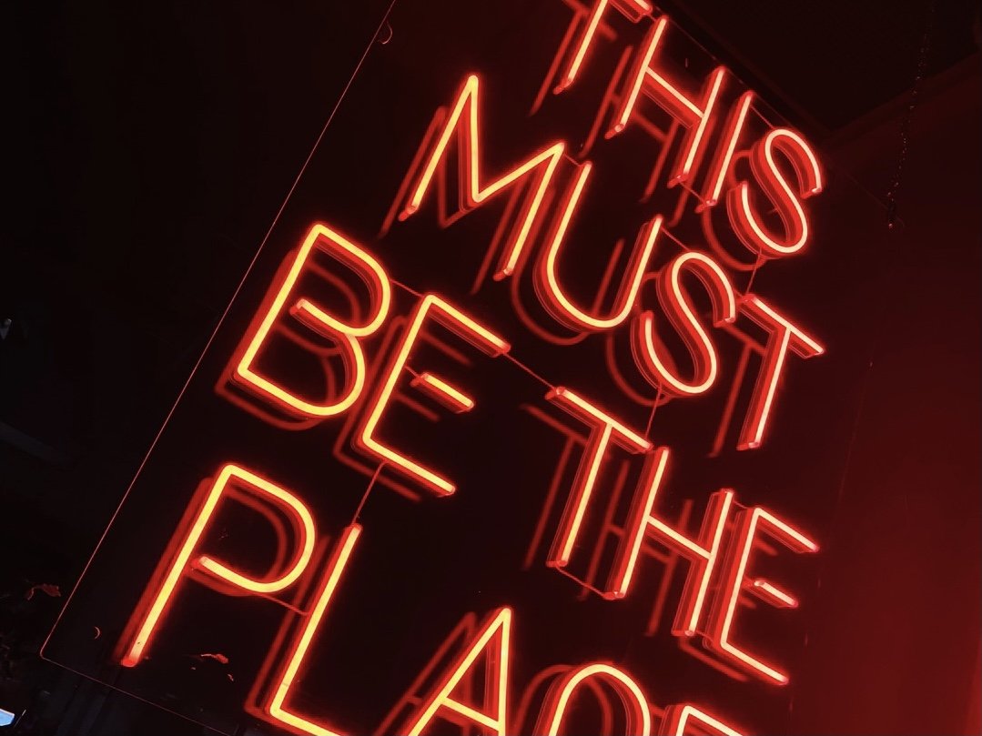 'THIS MUST BE THE PLACE' neon sign