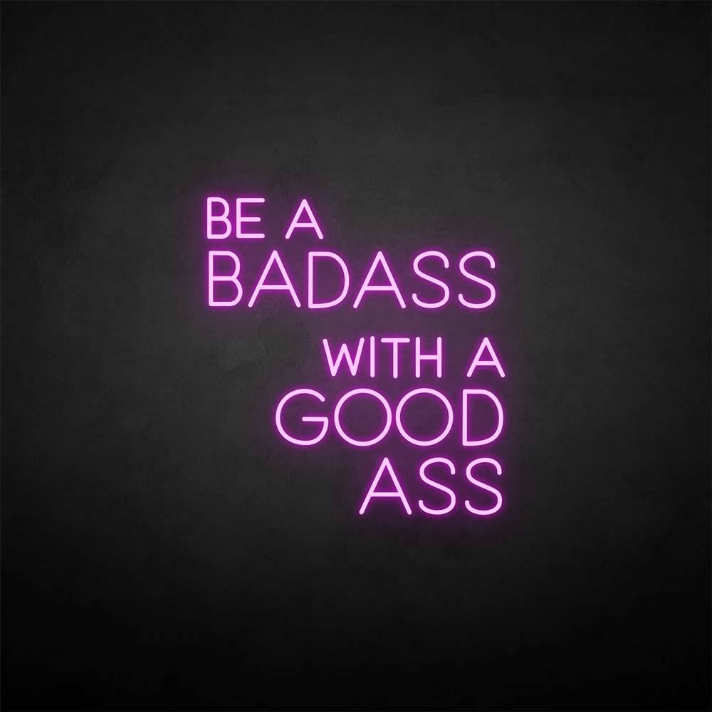 'Be a badass with a good ass' neon sign