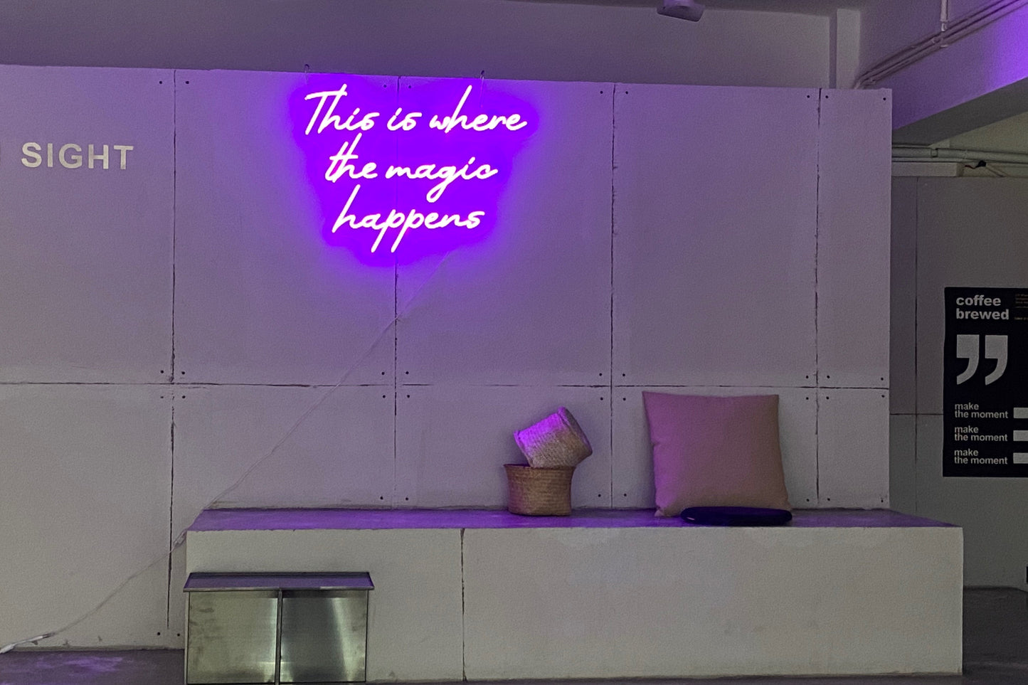 'This is where the magic happen' neon sign